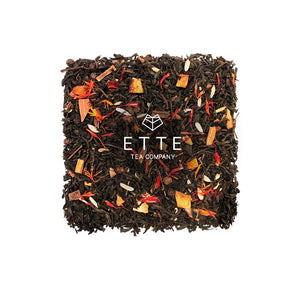 Black tea blend in square tea palette. Black tea filled with red safflower, cinnamon, orange peel and fennel. Inspired by Singapore local Chinese new year favourite snack, Bak Kwa or Rougan. 